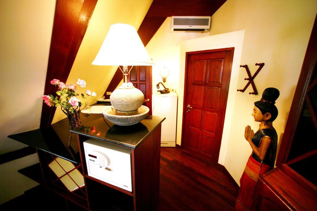 Coco Palace Resort Nai Harn Quarto foto
